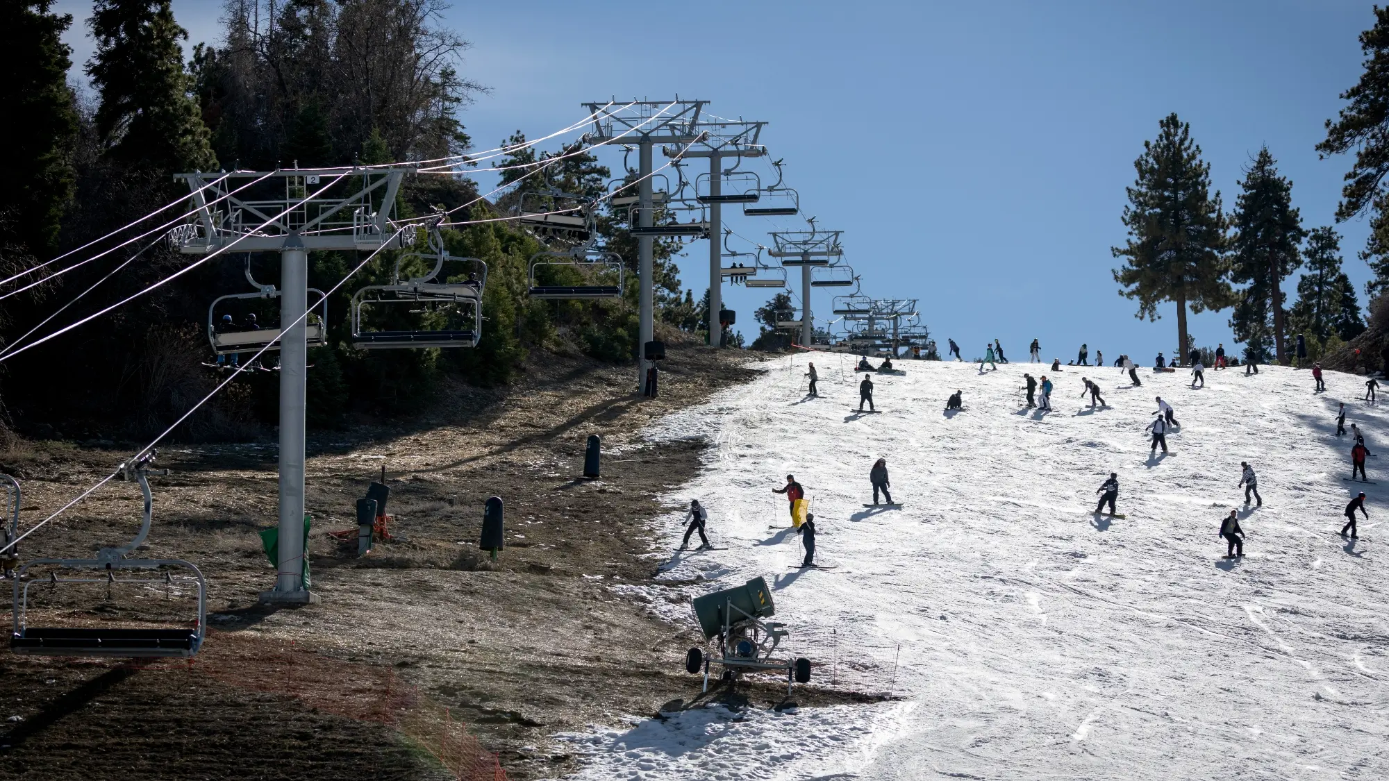 People ski and snowboard at Bear Mountain Ski Resort in December in Big Bear, California.
