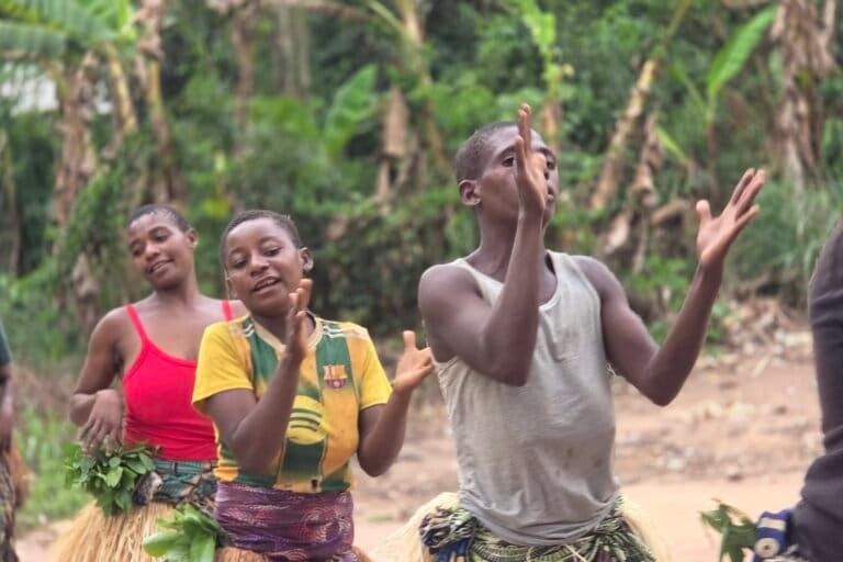Traditional dances are also among the main attractions for tourists in the southwestern region of the Central African Republic. Here, the Ba’aka, an Indigenous community, perform a traditional dance to welcome visitors in the village of Yobé-Sangha. Image by David Akana/ Mongabay.