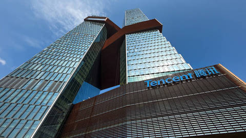 Tencent headquarters building exterior in Shenzhen, China, photographed on March 24, 2026, showing the modern office complex of Tencent Holdings, a major Chinese technology company specializing in social media, gaming, and digital services.