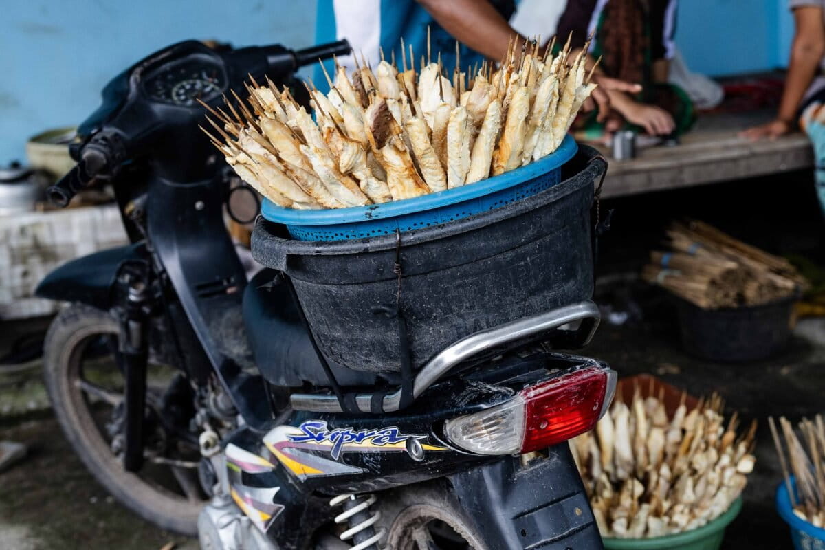 Shark satay is readied for transport at a warehouse in Rumbuk village