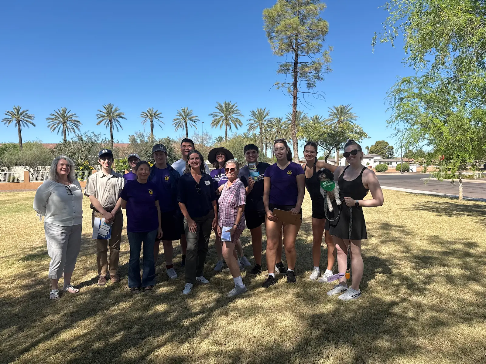 Members of the Salt River Project clean energy slate canvass voters in Tempe in early April. The clean energy slate is advocating for the utility to ditch all new fossil fuel development.
