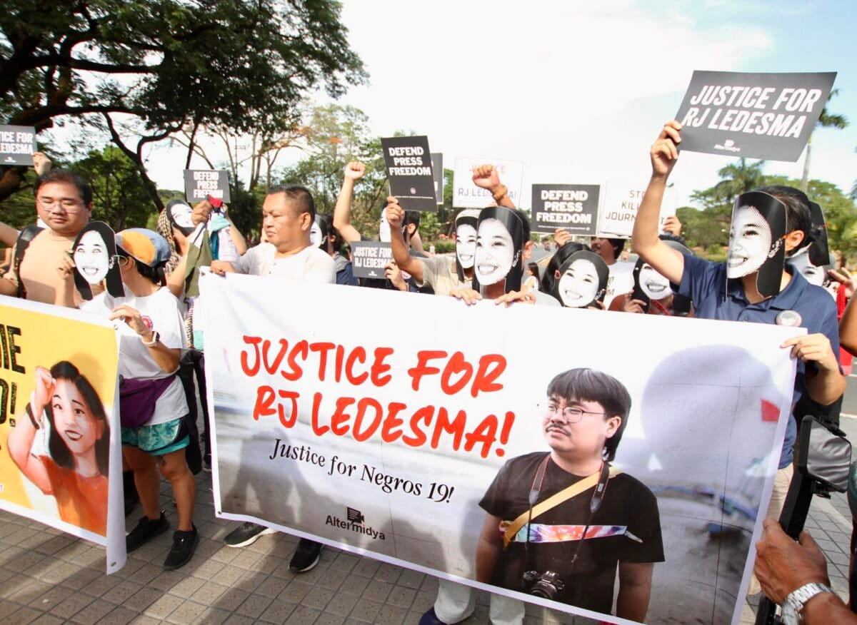 Media practitioners and press freedom advocates mark World Press Freedom Day on May 3, 2026 by calling for justice for slain community journalist RJ Ledesma at the University of the Philippines-Diliman in Quezon City. Photo by Ismael de Juan via the Manilla Times.